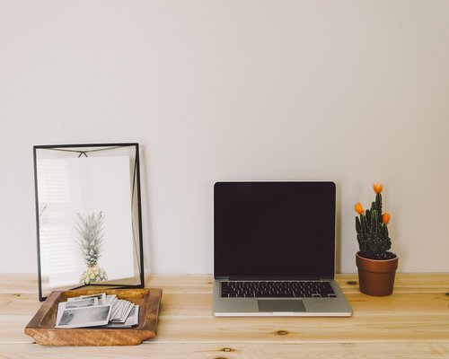 Person working comfortably in an ergonomic home office setup in Malaysia